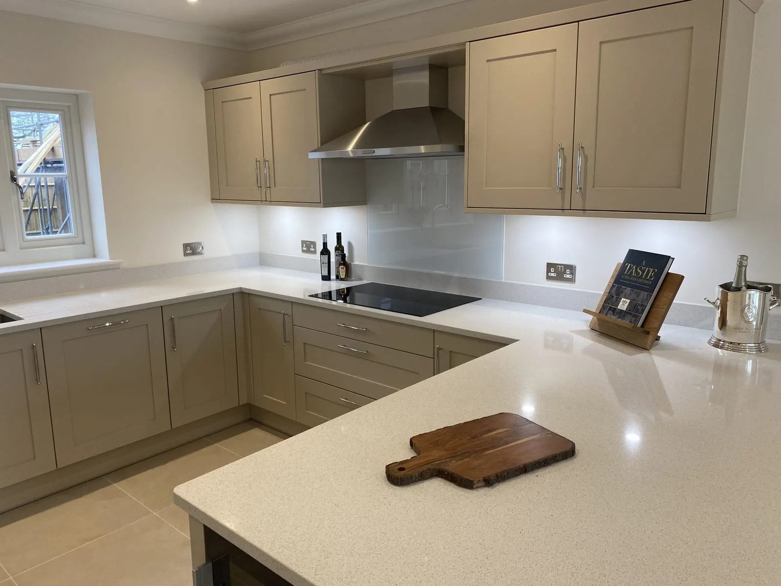 A spotless fitted kitchen in a new-build house after our handover clean