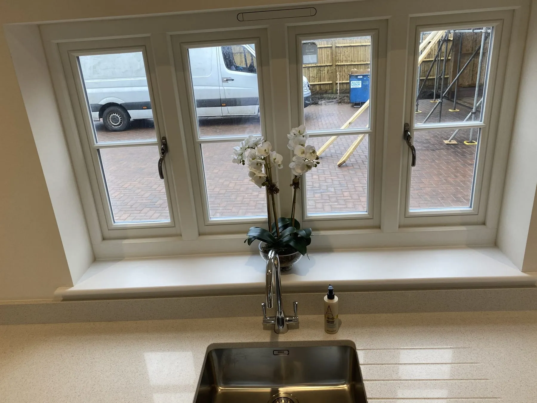 Sparkling clean windows above a kitchen sink